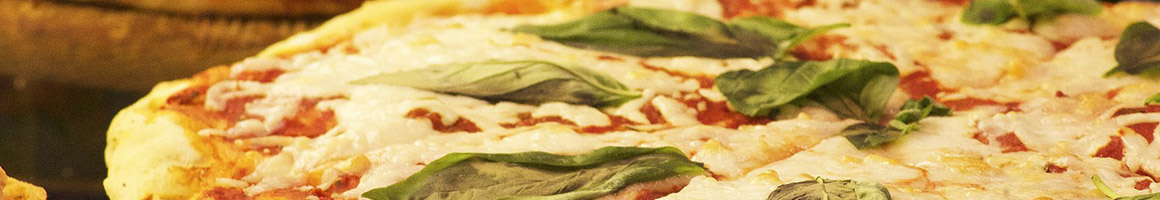 Eating Italian Pizza at Lo Cascio's Italian Restaurant.
